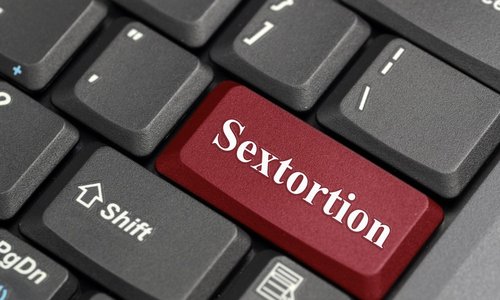 Sextortion Scammers Target Employees