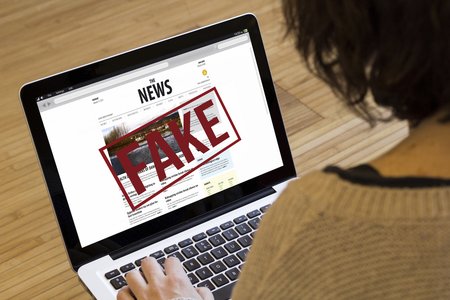 UK Spy Chief Hails Government Cell Tackling Kremlin Fake News
